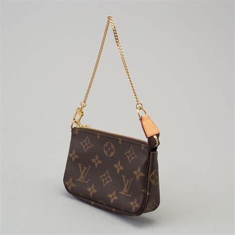 louis vuitton small items bag|louis vuitton small bag men.